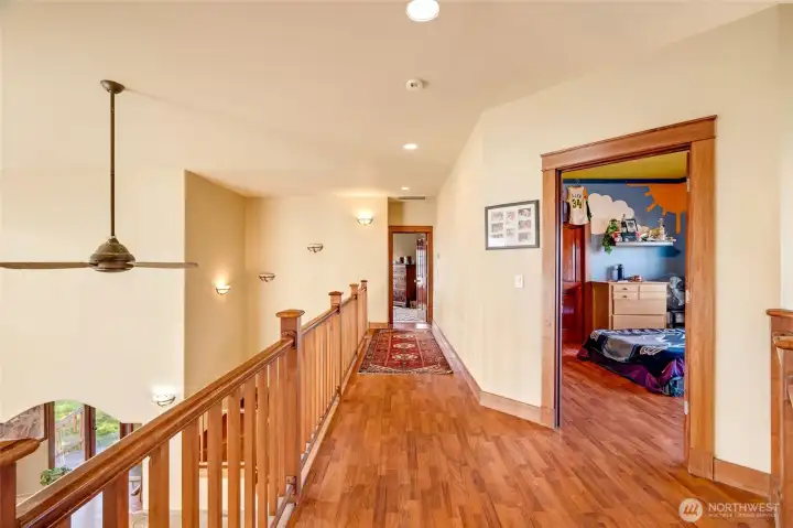 Upstairs hallway looking back towards Bedroom #2 and the Primary Suite.