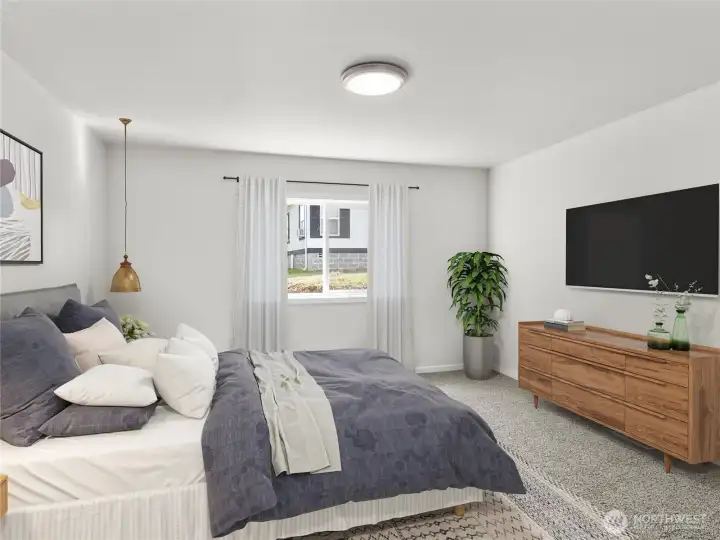 Move around freely in this roomy primary bedroom with dual closets and a private ensuite bath