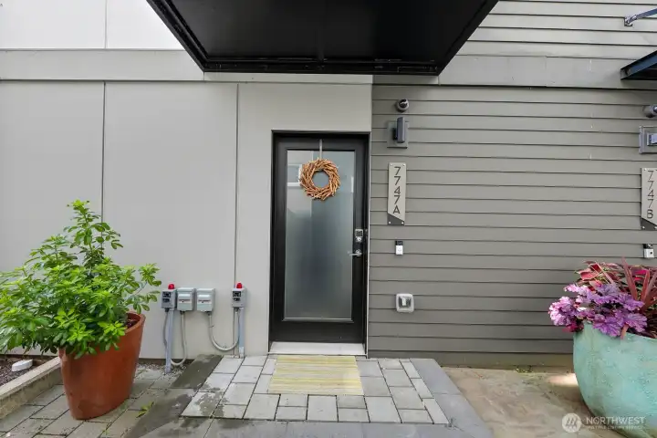 Entrance off a private walkway.