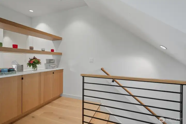 Iron handrails with oak trim.