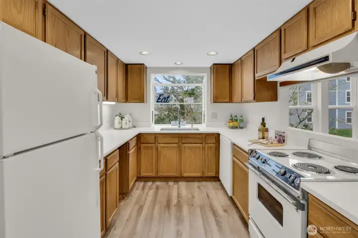 Enjoy the new: quartz countertops, undercount sink, faucet & dishwasher