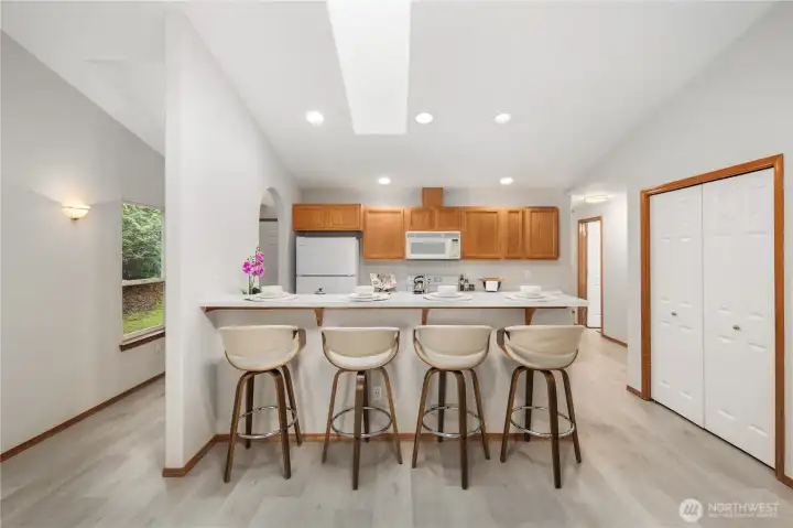 High-top breakfast bar and pantry complete the kitchen!