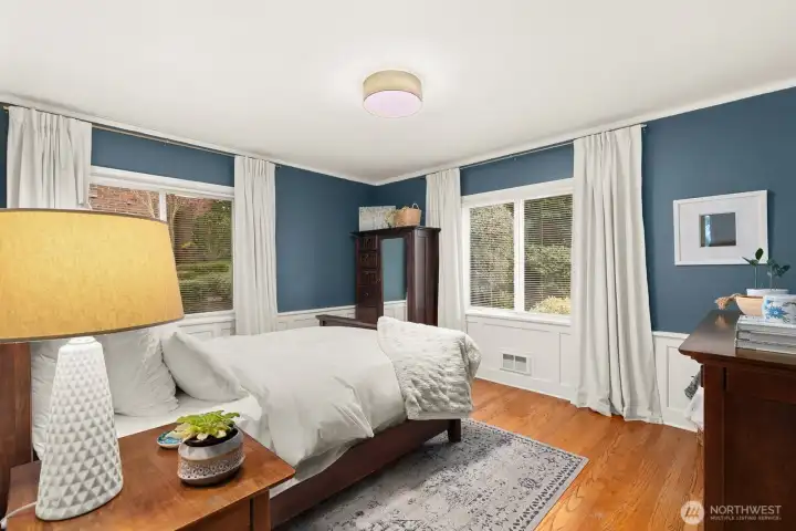 Two bedrooms on the main level include one with an ensuite, plus an additional ¾ bath.