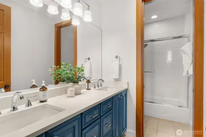 Double vanity and separate shower/water closet to serve second floor