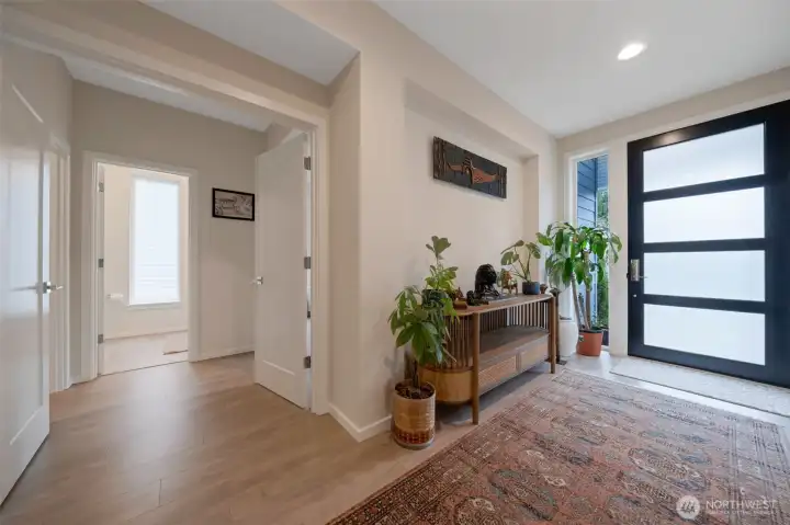 Double doors lead to main level guest suite