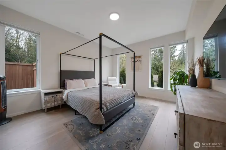 Main level guest suite - bedroom and attached bathroom