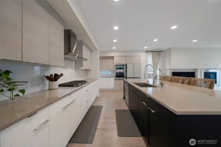 Two-tone kitchen cabinets and builder installed under-cabinet lighting