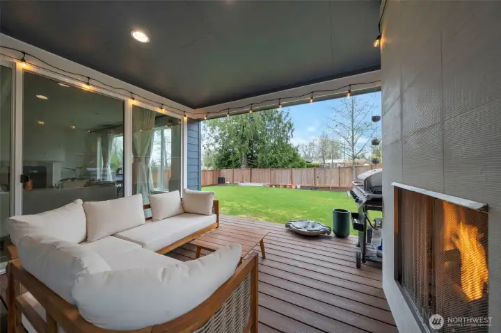 Enjoy outdoors year round in the covered patio with gas fireplace