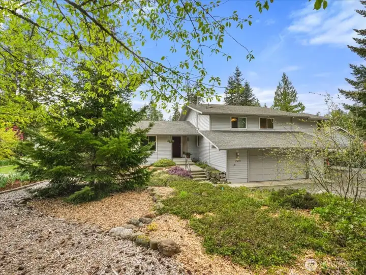 Beautiful landscaping on 3/4 acre lot.