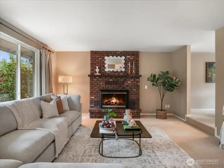 A gas fireplace nicely warms up the living room.