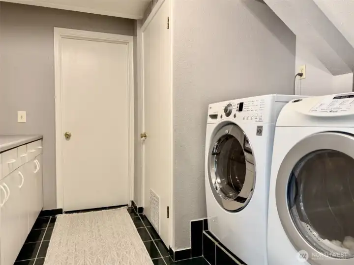 Washer, dryer, and countertop for folding clothes. Washer, dryer, and countertop for folding clothes.