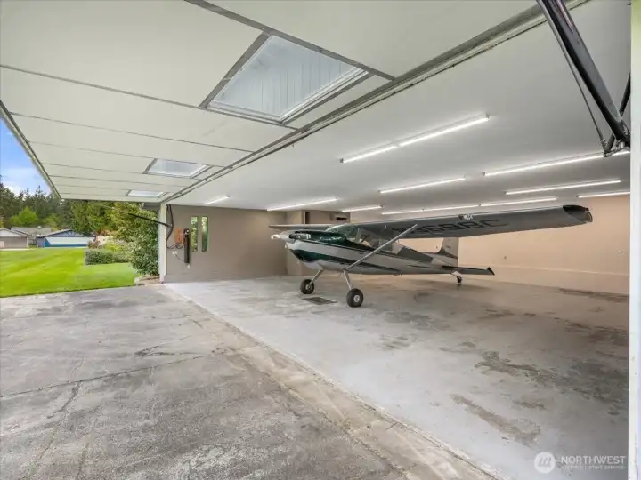 The hangar could also fit collector cars and has its own separate driveway.