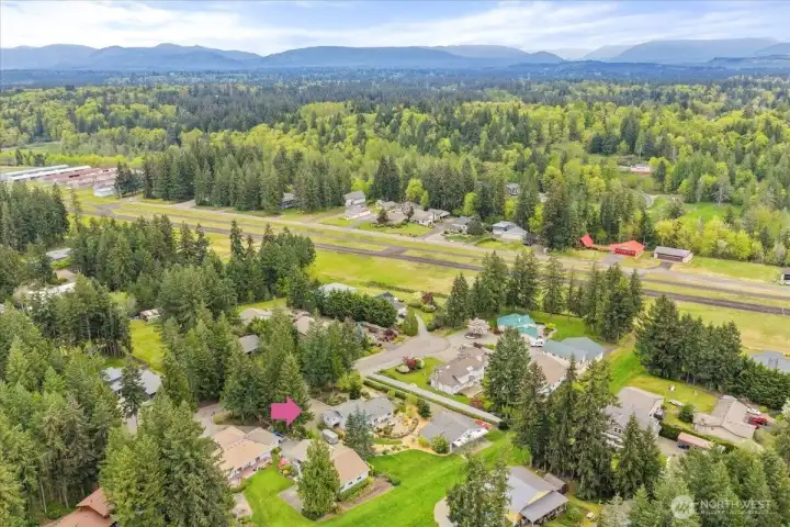 Neigboring airpark homes and Crest Airfield airport Runway 16/34.
