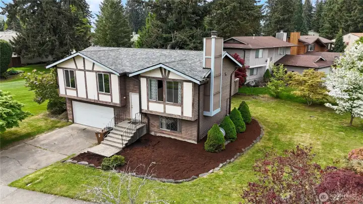 Nestled on a charming corner in a beautiful neighborhood. Nestled on a charming corner in a beautiful neighborhood.