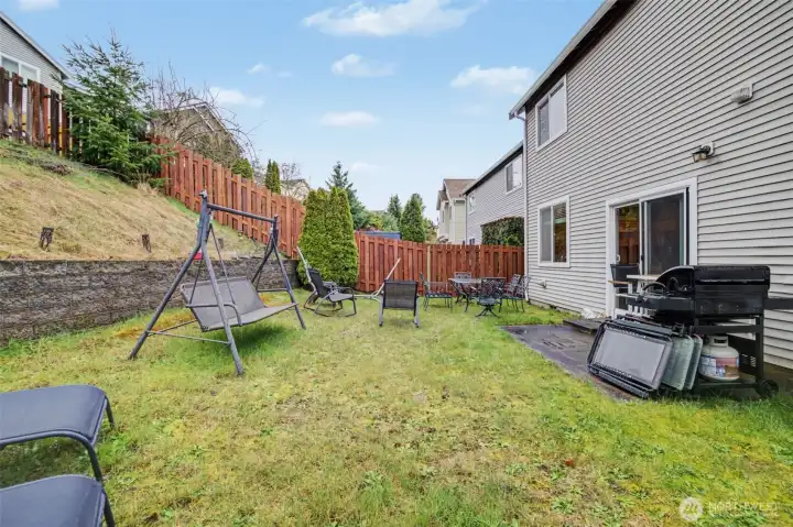Fully fenced back yard.