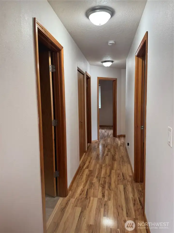 hallway to bedrooms and laundry room