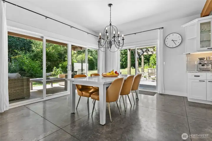 Dining space opens to covered patio & backyard