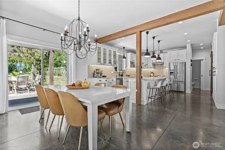 Dining space opens to covered patio & backyard