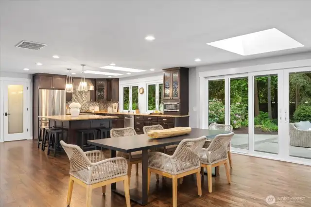 Generously-sized dining room has 14-ft wall-sized sliding doors that open to the outdoors!