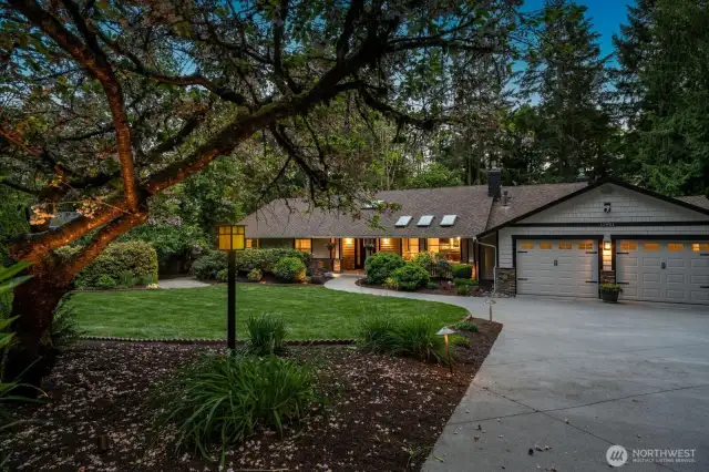 Gorgeous front yard that is spacious and has mature plantings. Home is private and has beautiful landscaping around the home.