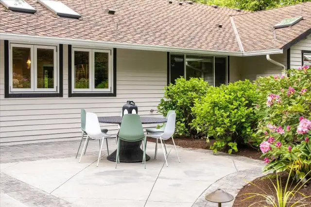 Large area near the Kitchen windows is a great space for alfresco dining. And since those windows open, it provides a fun element for entertaining and outdoor dining.