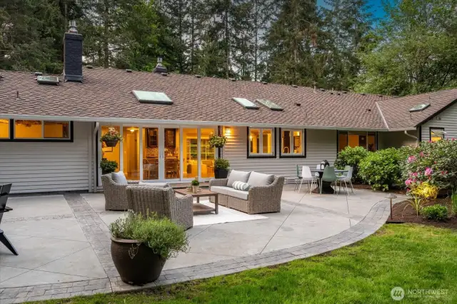 One-level rambler with a large, flat yard and wrap-around concrete patio is so hard to get! This home truly provides space for easy living, and enjoying nature!