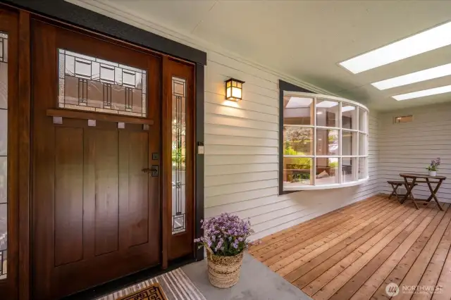 Spacious front patio great to sip your favorite morning beverage and look out to your private front yard!