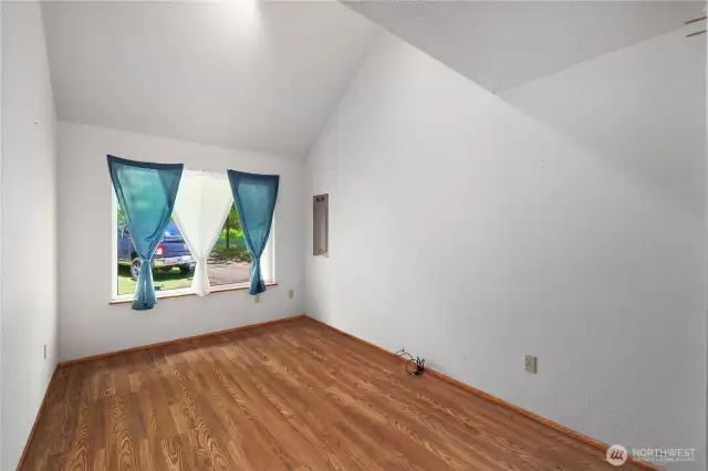 Bedroom on main floor. Deep floor plan with a closet to the right.
