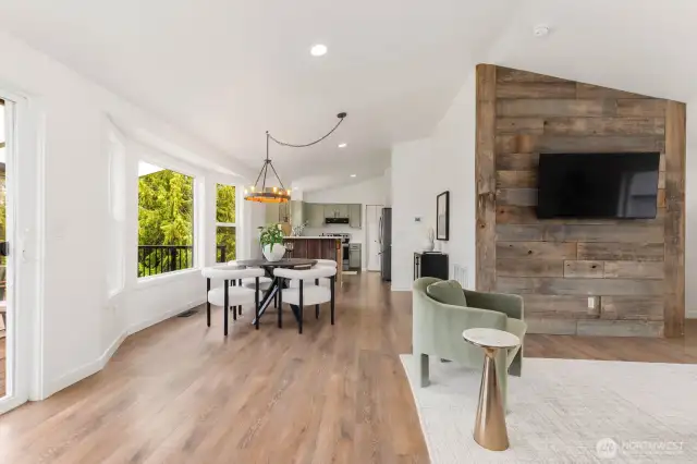 The flow from dining to kitchen is effortless and spacious. Whether you’re entertaining or meal-prepping, this open layout keeps everyone connected.