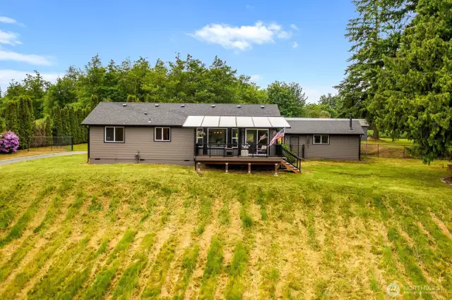 This updated rambler welcomes you with fresh paint, a new roof, and an inviting covered deck — perfect for year-round entertaining or your morning coffee with nature. Quality craftsmanship meets comfort and functionality.