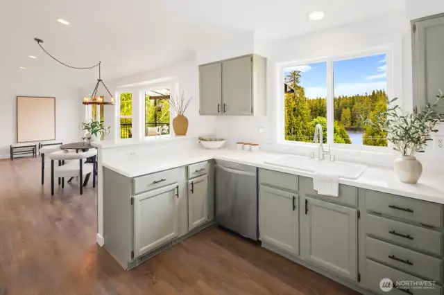 This kitchen keeps you connected to the action while offering a peaceful escape into nature just beyond the glass.