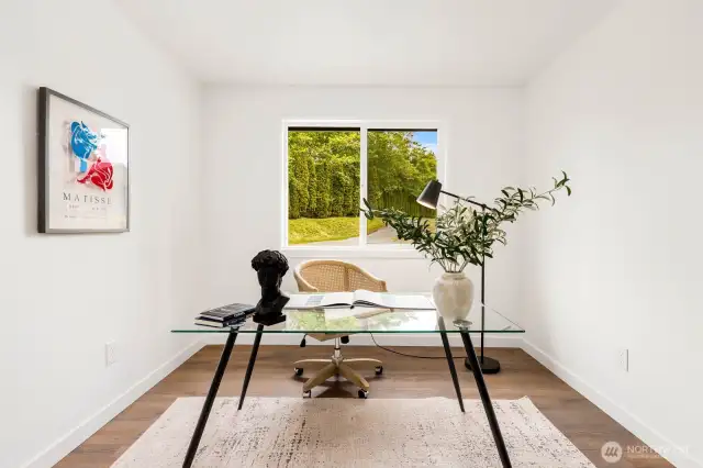 With a large window, closet space, and neutral design, this room easily transforms into a guest room, creative studio, or your dream home office.