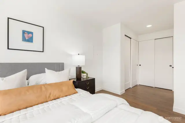 From the sleek closet doors to the rich new flooring, every detail in this room has been thoughtfully updated—providing a clean, modern canvas for your personal style.