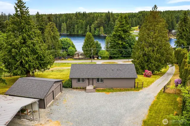 Your Lake Life Awaits  Just across the road from tranquil lake views and minutes from the boat launch, this home is perfectly placed to enjoy water adventures and peaceful forest living all in one.