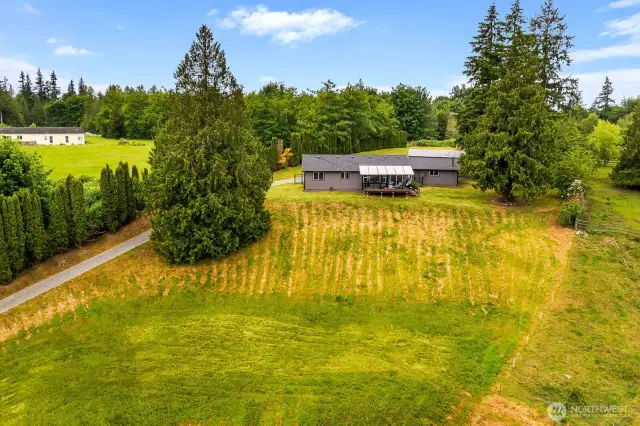 This wide, lush lot gives you endless options—expand the garden, create a pasture, or just soak up the tranquility of your own private retreat.