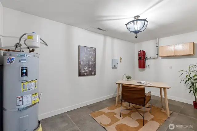 This space is a flex space for storage or make into a wine cellar!