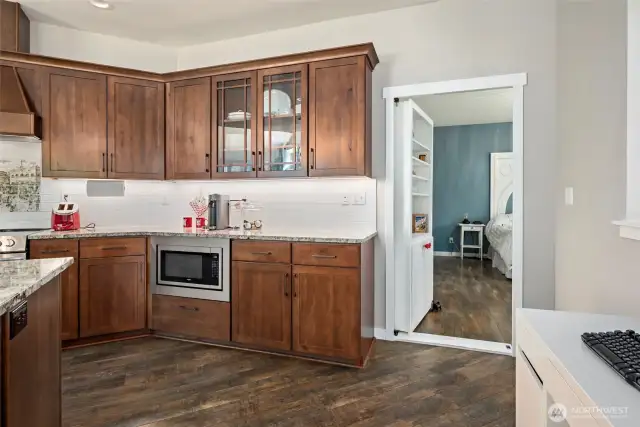 "Secret" door leads to the primary bedroom