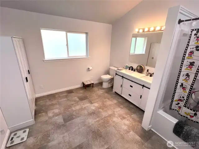 Large primary bathroom was fully remodeled