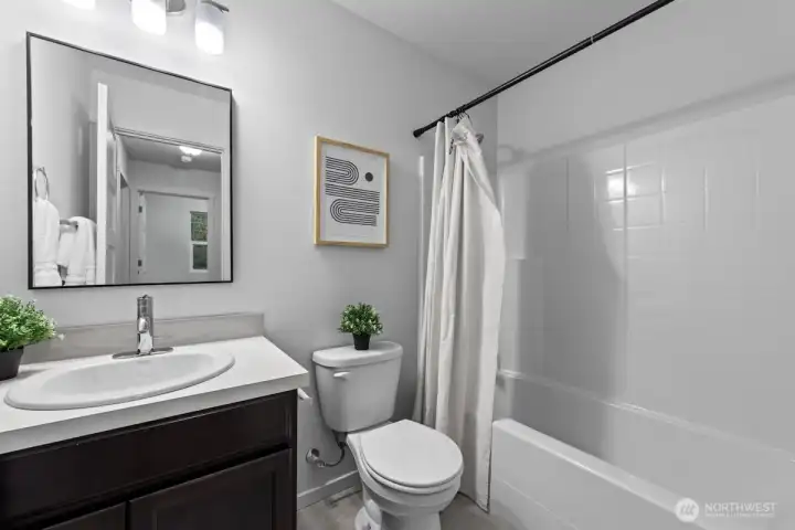 Photographs are for illustrative purposes only. Features, finishes, interior/exterior colors, landscaping and floorplan shown may vary from actual homes built.