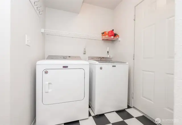 main floor Laundry room connects to garage door