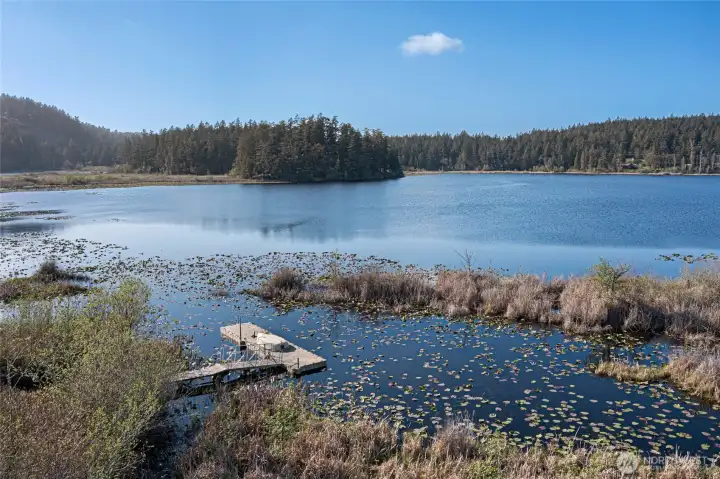 Enjoy direct waterfront living with a private dock ideal for launching kayaks, fishing, or simply soaking in serene lake views.
