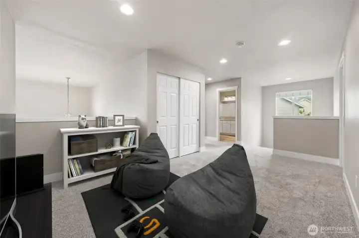 Loft at the top of the stairs has additional space~