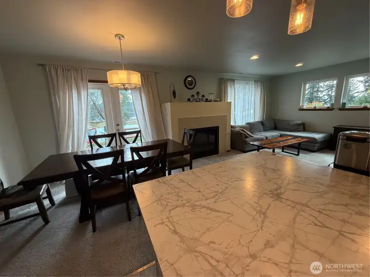French doors lead to deck overlooking Hood Canal