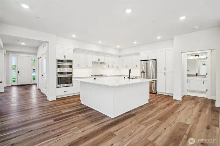 Can you see yourself entertaining here?  Why not become the Hostess with the mostess. HUGE Square Island w/pop up outlet.