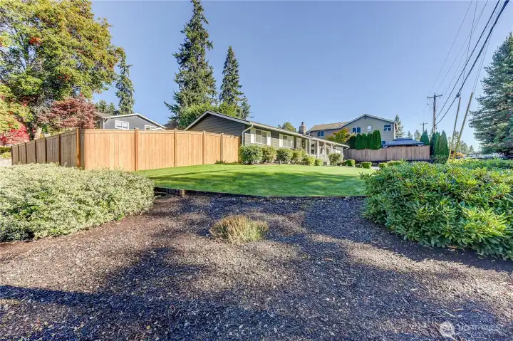 Large corner lot with a brand new fence!
