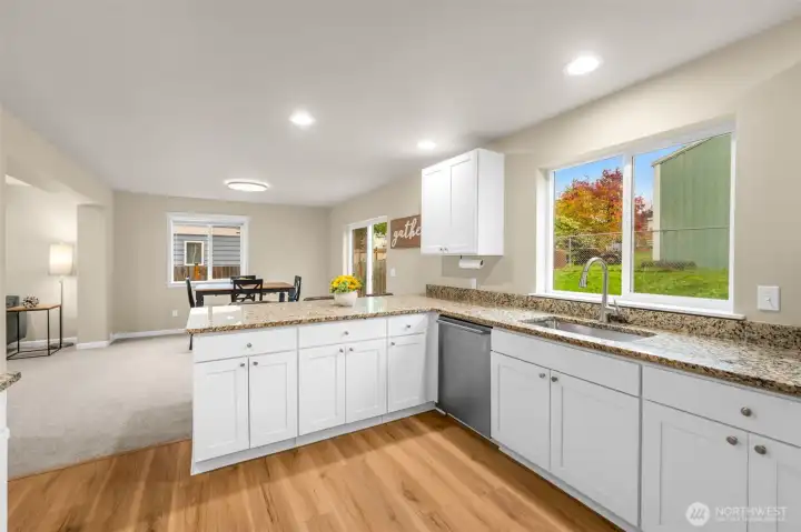 Brand new flooring in kitchen, laundry and bathrooms