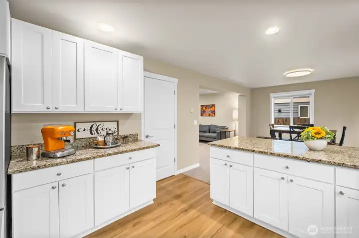 Tons of storage space throughout the kitchen (full size pantry not shown)