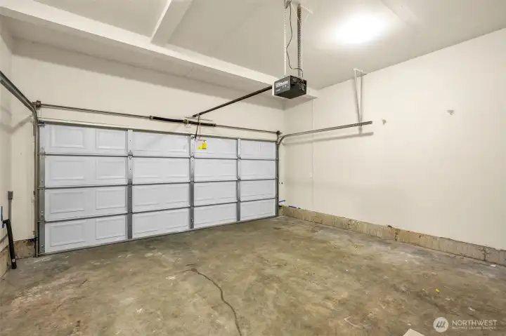 Tall 2 car garage, electric car charger located outside