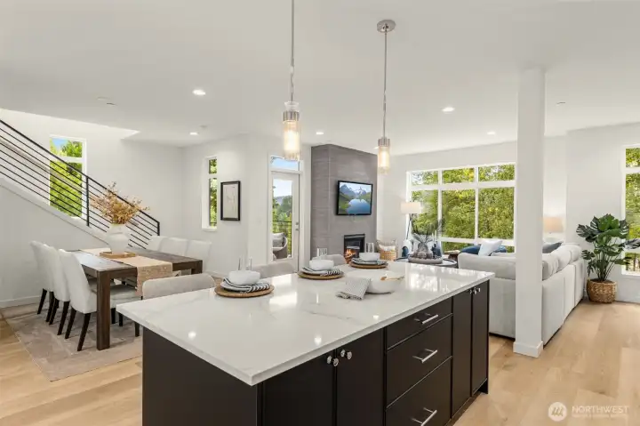 Massive living area, oversized island & bright windows making entertaining a breeze (photos of model home)