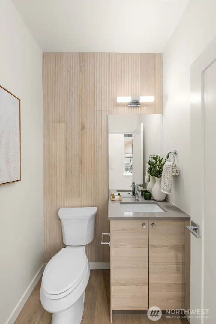 Even the powder room makes a statement—compact luxury at its finest. (photos of model home)